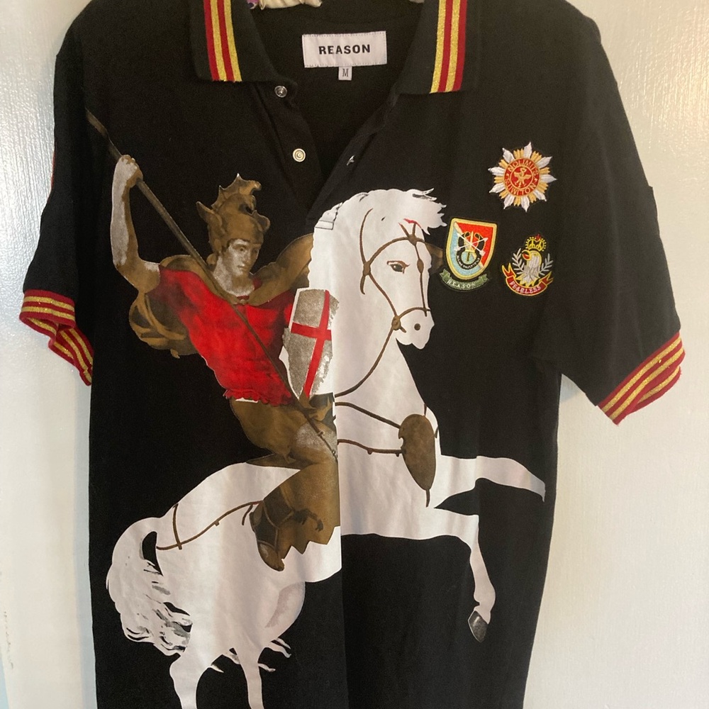 Up for consideration is a medium men’s Reason Polo shirt